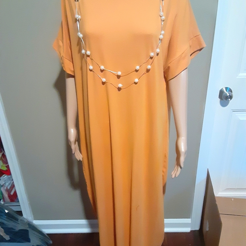 Long yellow dress with necklace
